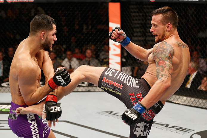 LAS VEGAS, NV - SEPTEMBER 27: (L-R) James Krause kicks Jorge Masvidal in their lightweight fight during the UFC 178 event inside the MGM Grand Garden Arena on September 27, 2014 in Las Vegas, Nevada. (Photo by Josh Hedges/Zuffa LLC/Zuffa LLC via Getty I