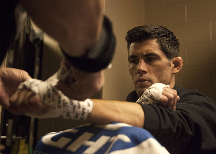 LAS VEGAS, NV - SEPTEMBER 27: Dominick Cruz gets his hands wrapped before his fight against Takeya Mizugaki during the UFC 178 event inside the MGM Grand Garden Arena on September 27, 2014 in Las Vegas, Nevada. (Photo by Brandon Magnus/Zuffa LLC/Zuffa LL