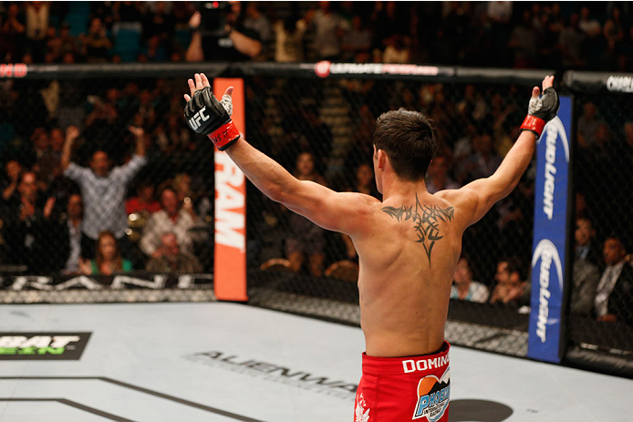 LAS VEGAS, NV - SEPTEMBER 27: Dominick Cruz celebrates after his victory over Takeya Mizugaki in their bantamweight fight during the UFC 178 event inside the MGM Grand Garden Arena on September 27, 2014 in Las Vegas, Nevada. (Photo by Josh Hedges/Zuffa