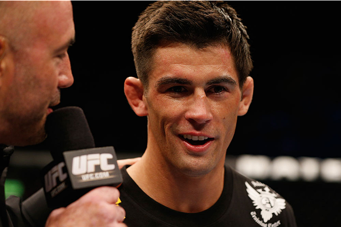 LAS VEGAS, NV - SEPTEMBER 27: Dominick Cruz speaks with Joe Rogan after his TKO victory over Takeya Mizugaki in their bantamweight fight during the UFC 178 event inside the MGM Grand Garden Arena on September 27, 2014 in Las Vegas, Nevada. (Photo by Jos