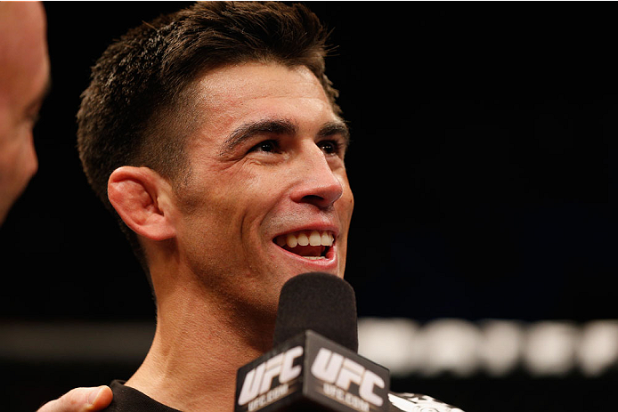 LAS VEGAS, NV - SEPTEMBER 27: Dominick Cruz speaks with Joe Rogan after his TKO victory over Takeya Mizugaki in their bantamweight fight during the UFC 178 event inside the MGM Grand Garden Arena on September 27, 2014 in Las Vegas, Nevada. (Photo by Jos