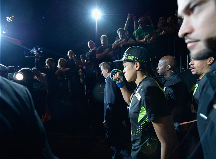 LAS VEGAS, NV - SEPTEMBER 27: Amanda Nunes prepares to enter the Octagon before facing Cat Zingano in their women's bantamweight fight during the UFC 178 event inside the MGM Grand Garden Arena on September 27, 2014 in Las Vegas, Nevada. (Photo by Jeff