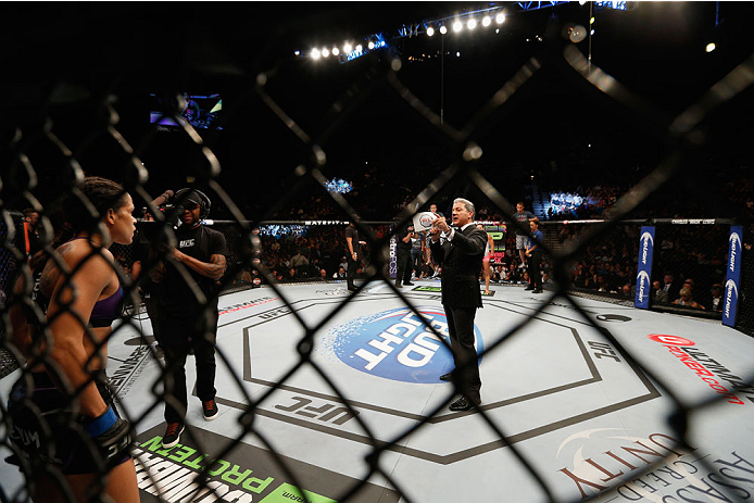 LAS VEGAS, NV - SEPTEMBER 27: Bruce Butter announces the fight between Amanda Nunes and Cat Zingano in their women's bantamweight fight during the UFC 178 event inside the MGM Grand Garden Arena on September 27, 2014 in Las Vegas, Nevada. (Photo by Josh