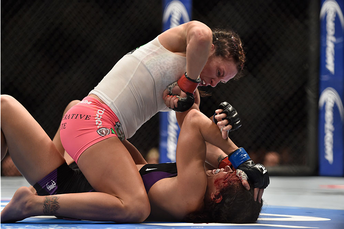 LAS VEGAS, NV - SEPTEMBER 27: (Top) Cat Zingano elbows Amanda Nunes in their women's bantamweight fight during the UFC 178 event inside the MGM Grand Garden Arena on September 27, 2014 in Las Vegas, Nevada. (Photo by Jeff Bottari/Zuffa LLC/Zuffa LLC via