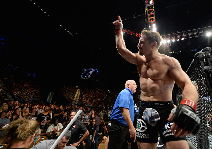 LAS VEGAS, NV - SEPTEMBER 27: Tim Kennedy prepares to enter the Octagon against Yoel Romero in their middleweight fight during the UFC 178 event inside the MGM Grand Garden Arena on September 27, 2014 in Las Vegas, Nevada. (Photo by Jeff Bottari/Zuffa L