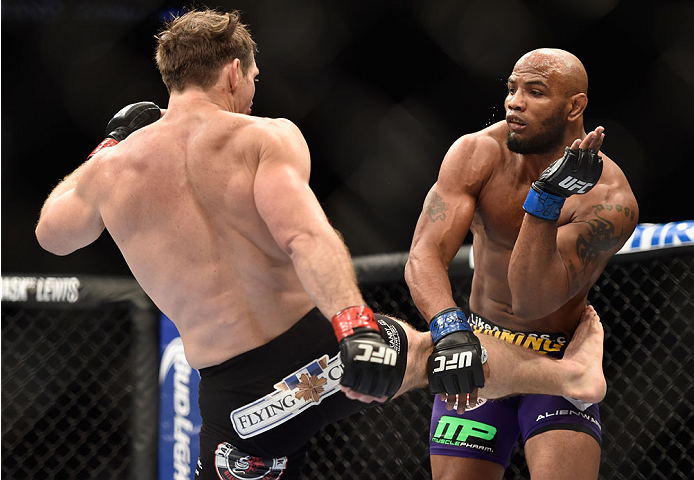 LAS VEGAS, NV - SEPTEMBER 27: (L-R) Tim Kennedy kicks Yoel Romero in their middleweight fight during the UFC 178 event inside the MGM Grand Garden Arena on September 27, 2014 in Las Vegas, Nevada. (Photo by Jeff Bottari/Zuffa LLC/Zuffa LLC via Getty Ima
