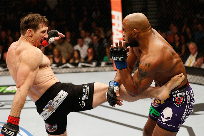 LAS VEGAS, NV - SEPTEMBER 27: (L-R) Tim Kennedy kicks Yoel Romero in their middleweight fight during the UFC 178 event inside the MGM Grand Garden Arena on September 27, 2014 in Las Vegas, Nevada. (Photo by Josh Hedges/Zuffa LLC/Zuffa LLC via Getty Imag