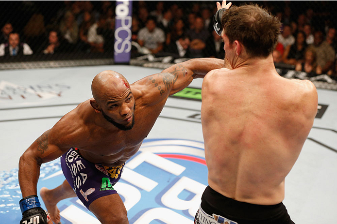 LAS VEGAS, NV - SEPTEMBER 27: (L-R) Yoel Romero punches Tim Kennedy in their middleweight fight during the UFC 178 event inside the MGM Grand Garden Arena on September 27, 2014 in Las Vegas, Nevada. (Photo by Josh Hedges/Zuffa LLC/Zuffa LLC via Getty Im