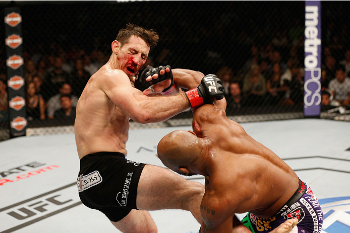 LAS VEGAS, NV - SEPTEMBER 27: (R-L) Yoel Romero punches Tim Kennedy in their middleweight fight during the UFC 178 event inside the MGM Grand Garden Arena on September 27, 2014 in Las Vegas, Nevada. (Photo by Josh Hedges/Zuffa LLC/Zuffa LLC via Getty Im