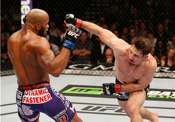 LAS VEGAS, NV - SEPTEMBER 27: (R-L) Tim Kennedy punches Yoel Romero in their middleweight fight during the UFC 178 event inside the MGM Grand Garden Arena on September 27, 2014 in Las Vegas, Nevada. (Photo by Josh Hedges/Zuffa LLC/Zuffa LLC via Getty Im