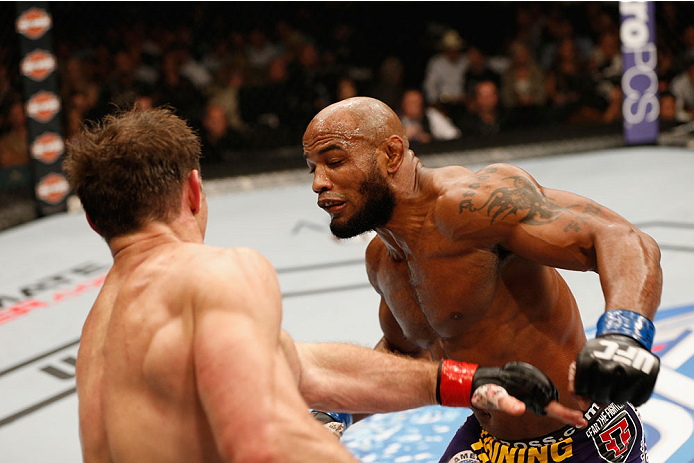 LAS VEGAS, NV - SEPTEMBER 27: (R-L) Yoel Romero punches Tim Kennedy in their middleweight fight during the UFC 178 event inside the MGM Grand Garden Arena on September 27, 2014 in Las Vegas, Nevada. (Photo by Josh Hedges/Zuffa LLC/Zuffa LLC via Getty Im