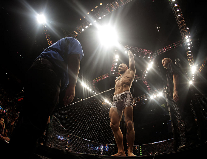 LAS VEGAS, NV - SEPTEMBER 27: Conor McGregor prepares to enter the Octagon before his fight against Dustin Poirier during the UFC 178 event inside the MGM Grand Garden Arena on September 27, 2014 in Las Vegas, Nevada. (Photo by Brandon Magnus/Zuffa LLC/Z