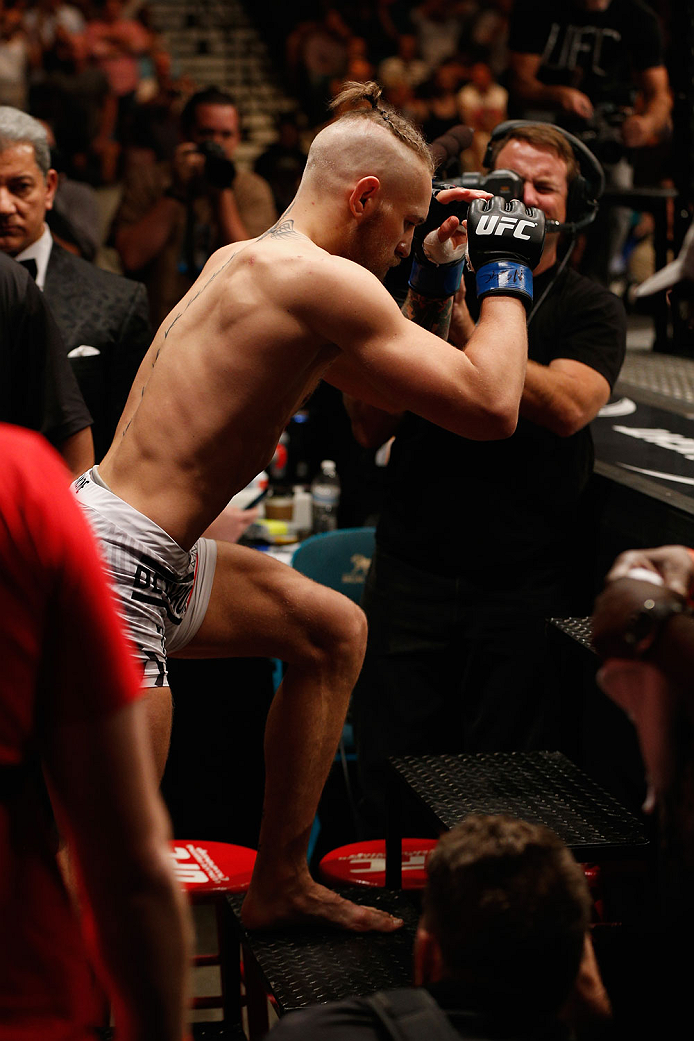 LAS VEGAS, NV - SEPTEMBER 27: Conor McGregor enters the Octagon before his featherweight fight with Dustin Poirier during the UFC 178 event inside the MGM Grand Garden Arena on September 27, 2014 in Las Vegas, Nevada. (Photo by Josh Hedges/Zuffa LLC/Zu