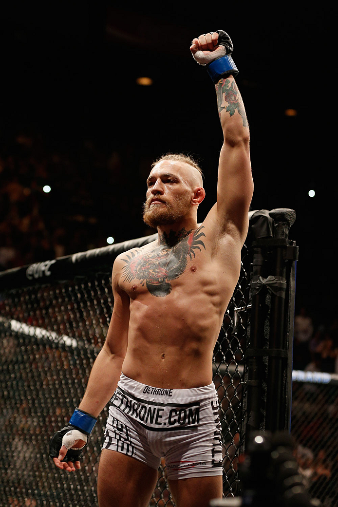 LAS VEGAS, NV - SEPTEMBER 27: Conor McGregor enters the Octagon for his featherweight fight with Dustin Poirier during the UFC 178 event inside the MGM Grand Garden Arena on September 27, 2014 in Las Vegas, Nevada. (Photo by Josh Hedges/Zuffa LLC/Zuffa
