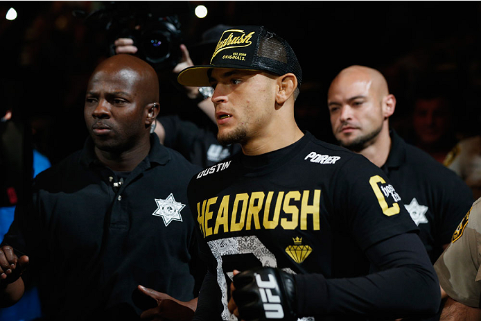 LAS VEGAS, NV - SEPTEMBER 27: Dustin Poirier enters the arena for his fight with Conor McGregor before their featherweight fight during the UFC 178 event inside the MGM Grand Garden Arena on September 27, 2014 in Las Vegas, Nevada. (Photo by Josh Hedges