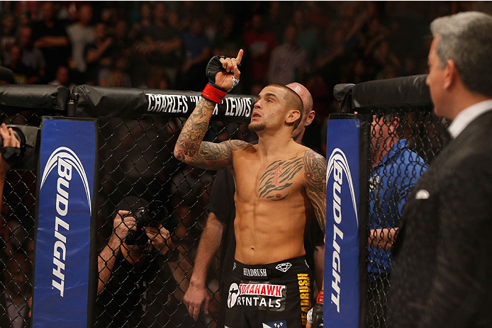 LAS VEGAS, NV - SEPTEMBER 27: Dustin Poirier enters the Octagon for his featherweight fight with Conor McGregor during the UFC 178 event inside the MGM Grand Garden Arena on September 27, 2014 in Las Vegas, Nevada. (Photo by Josh Hedges/Zuffa LLC/Zuffa