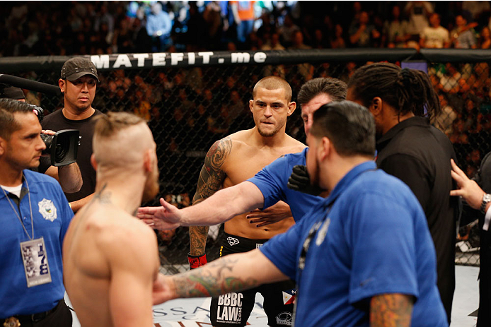 LAS VEGAS, NV - SEPTEMBER 27: (L-R) Conor McGregor and Dustin Poirier square off before their featherweight fight during the UFC 178 event inside the MGM Grand Garden Arena on September 27, 2014 in Las Vegas, Nevada. (Photo by Josh Hedges/Zuffa LLC/Zuff