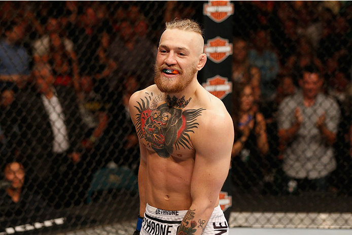 LAS VEGAS, NV - SEPTEMBER 27: Conor McGregor celebrates his win over Dustin Poirier after their featherweight fight during the UFC 178 event inside the MGM Grand Garden Arena on September 27, 2014 in Las Vegas, Nevada. (Photo by Josh Hedges/Zuffa LLC/Zu