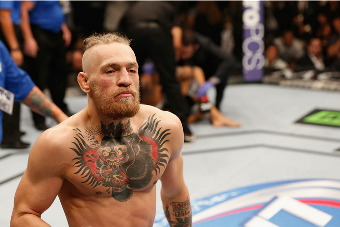 LAS VEGAS, NV - SEPTEMBER 27: Conor McGregor celebrates his TKO win over Dustin Poirier after their featherweight fight during the UFC 178 event inside the MGM Grand Garden Arena on September 27, 2014 in Las Vegas, Nevada. (Photo by Josh Hedges/Zuffa LL