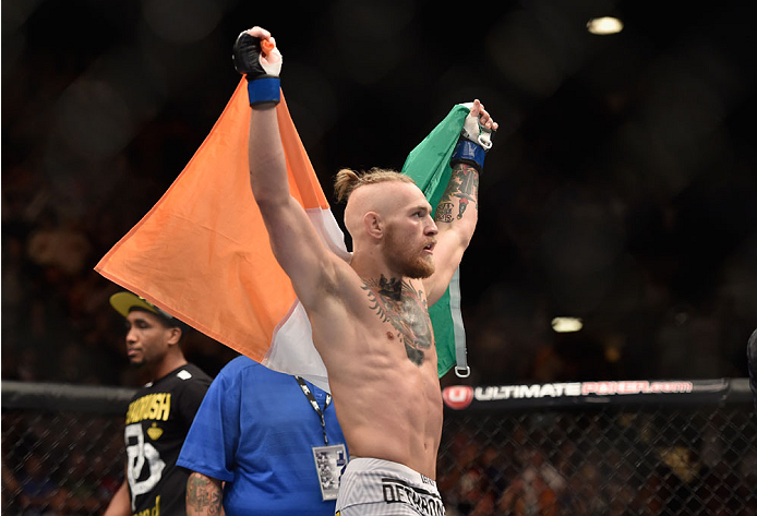 LAS VEGAS, NV - SEPTEMBER 27: Conor McGregor celebrates his win over Dustin Poirier after their featherweight fight during the UFC 178 event inside the MGM Grand Garden Arena on September 27, 2014 in Las Vegas, Nevada. (Photo by Jeff Bottari/Zuffa LLC/Z