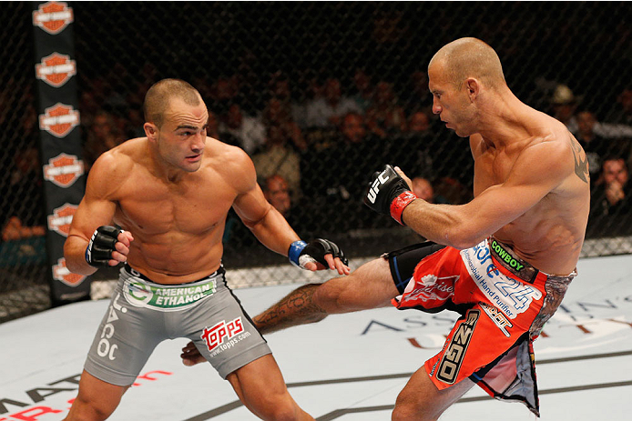 LAS VEGAS, NV - SEPTEMBER 27: (R-L) Donald Cerrone kicks Eddie Alvarez in their lightweight fight during the UFC 178 event inside the MGM Grand Garden Arena on September 27, 2014 in Las Vegas, Nevada. (Photo by Josh Hedges/Zuffa LLC/Zuffa LLC via Getty