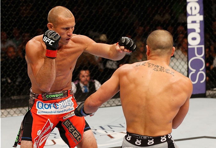 LAS VEGAS, NV - SEPTEMBER 27: (L-R) Donald Cerrone squares off with Eddie Alvarez in their lightweight fight during the UFC 178 event inside the MGM Grand Garden Arena on September 27, 2014 in Las Vegas, Nevada. (Photo by Josh Hedges/Zuffa LLC/Zuffa LLC