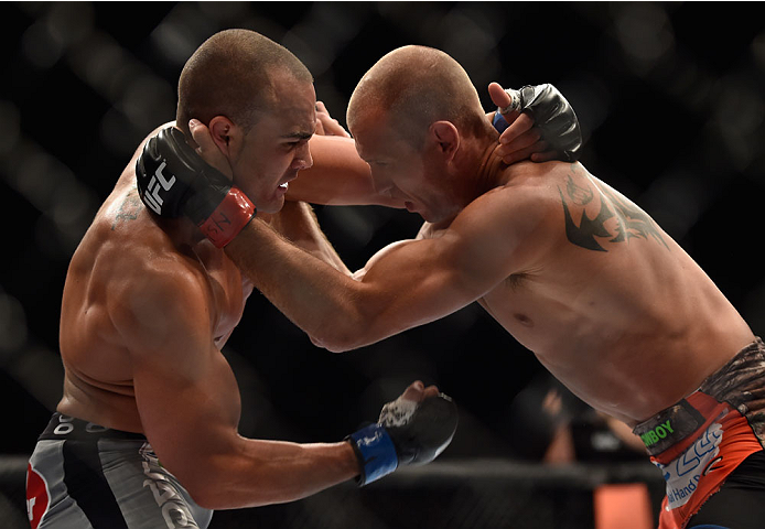 LAS VEGAS, NV - SEPTEMBER 27: (L-R) Eddie Alvarez punches Donald Cerrone in their lightweight fight during the UFC 178 event inside the MGM Grand Garden Arena on September 27, 2014 in Las Vegas, Nevada. (Photo by Jeff Bottari/Zuffa LLC/Zuffa LLC via Get