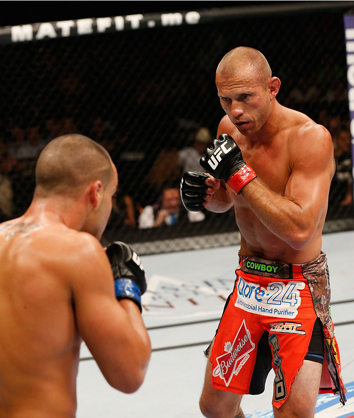 LAS VEGAS, NV - SEPTEMBER 27: (R-L) Donald Cerrone squares off with Eddie Alvarez in their lightweight fight during the UFC 178 event inside the MGM Grand Garden Arena on September 27, 2014 in Las Vegas, Nevada. (Photo by Josh Hedges/Zuffa LLC/Zuffa LLC