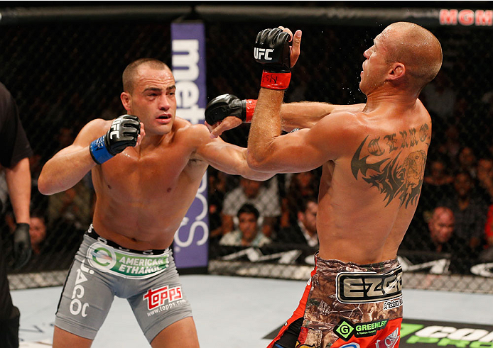 LAS VEGAS, NV - SEPTEMBER 27: (L-R) Eddie Alvarez punches Donald Cerrone in their lightweight fight during the UFC 178 event inside the MGM Grand Garden Arena on September 27, 2014 in Las Vegas, Nevada. (Photo by Josh Hedges/Zuffa LLC/Zuffa LLC via Gett
