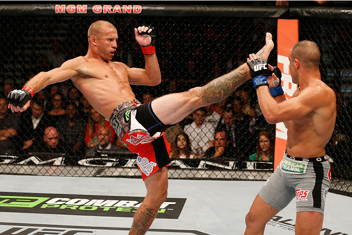 LAS VEGAS, NV - SEPTEMBER 27: (L-R) Donald Cerrone kicks Eddie Alvarez in their lightweight fight during the UFC 178 event inside the MGM Grand Garden Arena on September 27, 2014 in Las Vegas, Nevada. (Photo by Josh Hedges/Zuffa LLC/Zuffa LLC via Getty