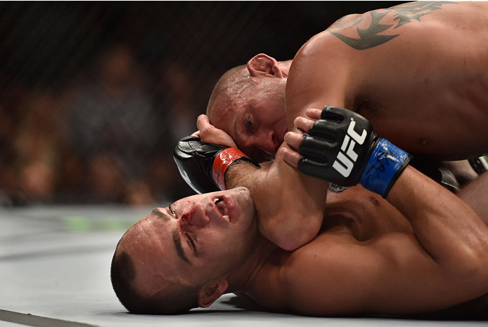 LAS VEGAS, NV - SEPTEMBER 27: (Top) Donald Cerrone controls the body of Eddie Alvarez in their lightweight fight during the UFC 178 event inside the MGM Grand Garden Arena on September 27, 2014 in Las Vegas, Nevada. (Photo by Jeff Bottari/Zuffa LLC/Zuff