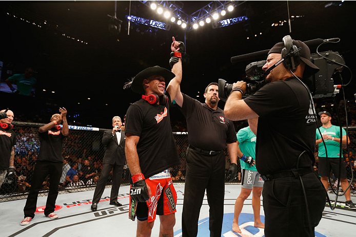 LAS VEGAS, NV - SEPTEMBER 27: (L-R) Donald Cerrone celebrates his victory over Eddie Alvarez after their lightweight fight during the UFC 178 event inside the MGM Grand Garden Arena on September 27, 2014 in Las Vegas, Nevada. (Photo by Josh Hedges/Zuffa