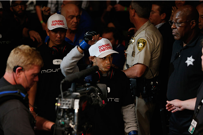 LAS VEGAS, NV - SEPTEMBER 27: Challenger Chris Cariaso enters the arena before his flyweight championship fight with Demetrious Johnson during the UFC 178 event inside the MGM Grand Garden Arena on September 27, 2014 in Las Vegas, Nevada. (Photo by Josh