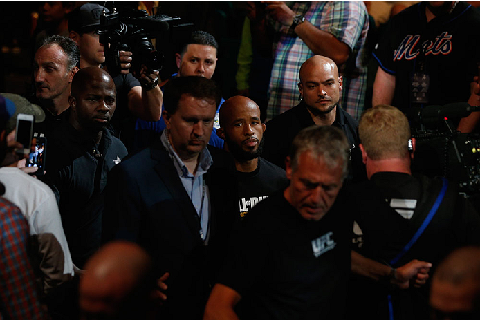 LAS VEGAS, NV - SEPTEMBER 27: UFC Flyweight champion Demetrious Johnson enters the arena for his flyweight championship fight with Chris Cariaso during the UFC 178 event inside the MGM Grand Garden Arena on September 27, 2014 in Las Vegas, Nevada. (Phot