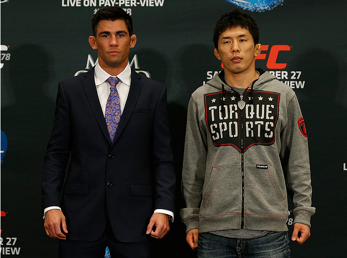 LAS VEGAS, NV - SEPTEMBER 25: (L-R) Opponents Dominick Cruz and Takeya Mizugaki of Japan pose for photos during the UFC 178 Ultimate Media Day at the MGM Grand Hotel/Casino on September 25, 2014 in Las Vegas, Nevada. (Photo by Josh Hedges/Zuffa LLC/Zuffa
