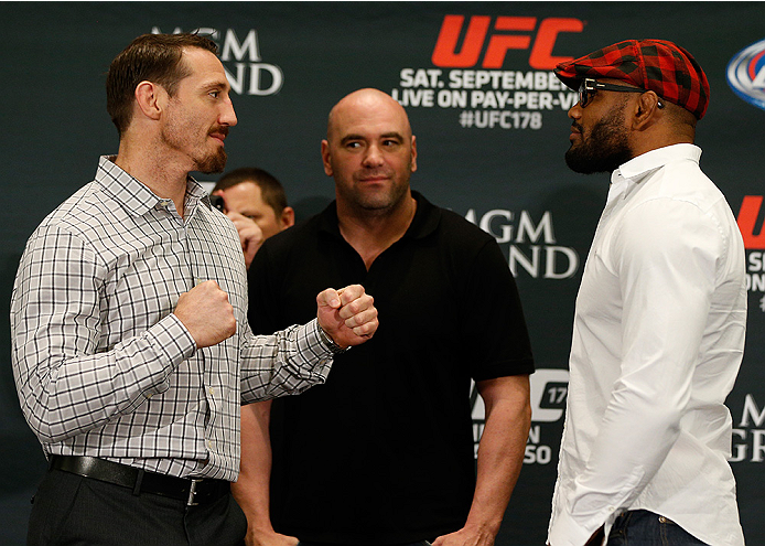 LAS VEGAS, NV - SEPTEMBER 25: (L-R) Opponents Tim Kennedy and Yoel Romero of Cuba face off during the UFC 178 Ultimate Media Day at the MGM Grand Hotel/Casino on September 25, 2014 in Las Vegas, Nevada. (Photo by Josh Hedges/Zuffa LLC/Zuffa LLC via Getty