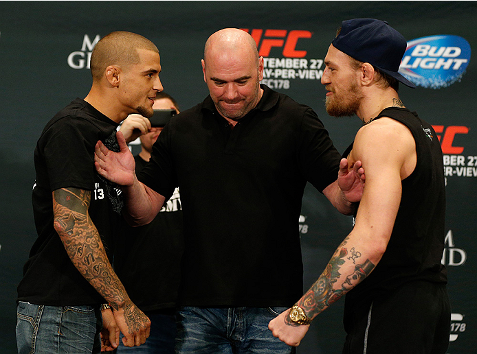 LAS VEGAS, NV - SEPTEMBER 25: (L-R) Opponents Dustin Poirier and Conor McGregor face off during the UFC 178 Ultimate Media Day at the MGM Grand Hotel/Casino on September 25, 2014 in Las Vegas, Nevada. (Photo by Josh Hedges/Zuffa LLC/Zuffa LLC via Getty I
