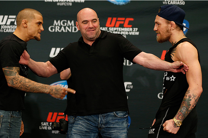 LAS VEGAS, NV - SEPTEMBER 25: (L-R) Opponents Dustin Poirier and Conor McGregor face off during the UFC 178 Ultimate Media Day at the MGM Grand Hotel/Casino on September 25, 2014 in Las Vegas, Nevada. (Photo by Josh Hedges/Zuffa LLC/Zuffa LLC via Getty I