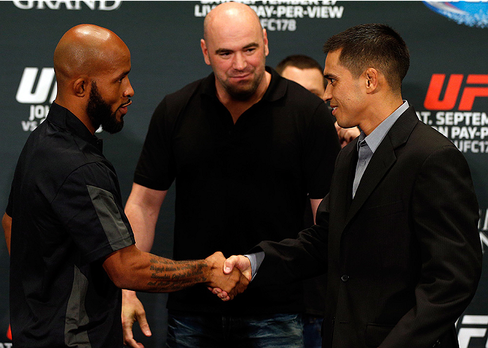 LAS VEGAS, NV - SEPTEMBER 25: (L-R) Opponents Demetrious Johnson and Chris Cariaso shake hands during the UFC 178 Ultimate Media Day at the MGM Grand Hotel/Casino on September 25, 2014 in Las Vegas, Nevada. (Photo by Josh Hedges/Zuffa LLC/Zuffa LLC via G