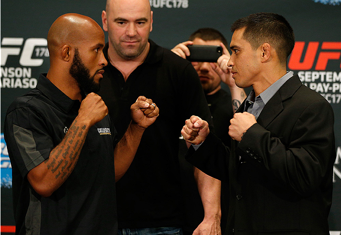 LAS VEGAS, NV - SEPTEMBER 25: (L-R) Opponents Demetrious Johnson and Chris Cariaso face off during the UFC 178 Ultimate Media Day at the MGM Grand Hotel/Casino on September 25, 2014 in Las Vegas, Nevada. (Photo by Josh Hedges/Zuffa LLC/Zuffa LLC via Gett