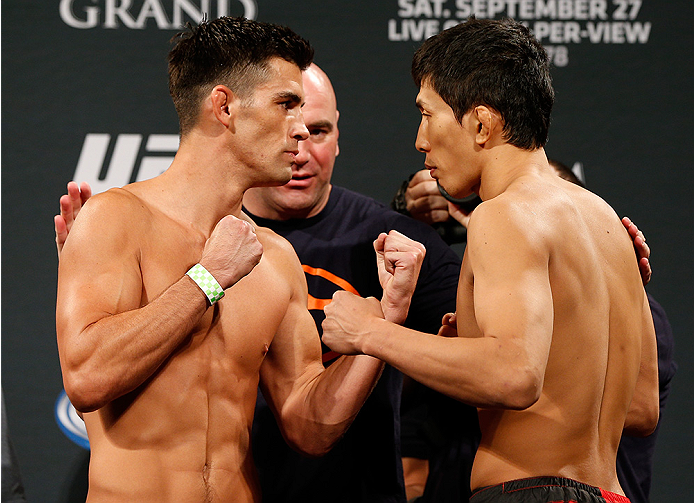 LAS VEGAS, NV - SEPTEMBER 26: (L-R) Opponents Dominick Cruz and Takeya Mizugaki of Japan face off during the UFC 178 weigh-in at the MGM Grand Conference Center on September 26, 2014 in Las Vegas, Nevada. (Photo by Josh Hedges/Zuffa LLC/Zuffa LLC via Get