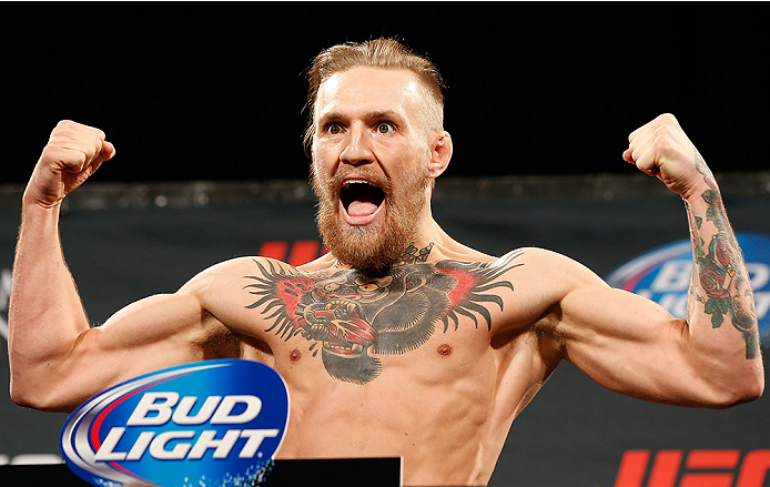 LAS VEGAS, NV - SEPTEMBER 26: Conor McGregor of Ireland poses on the scale after weighing in during the UFC 178 weigh-in at the MGM Grand Conference Center on September 26, 2014 in Las Vegas, Nevada. (Photo by Josh Hedges/Zuffa LLC/Zuffa LLC via Getty Im