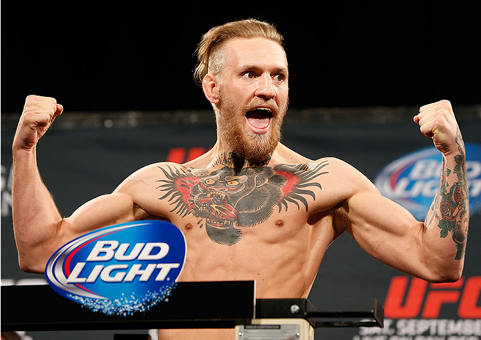 LAS VEGAS, NV - SEPTEMBER 26: Conor McGregor of Ireland poses on the scale after weighing in during the UFC 178 weigh-in at the MGM Grand Conference Center on September 26, 2014 in Las Vegas, Nevada. (Photo by Josh Hedges/Zuffa LLC/Zuffa LLC via Getty Im