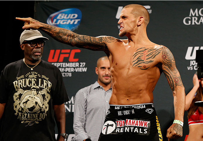 LAS VEGAS, NV - SEPTEMBER 26: Dustin Poirier taunts the Irish fans in attendance during the UFC 178 weigh-in at the MGM Grand Conference Center on September 26, 2014 in Las Vegas, Nevada. (Photo by Josh Hedges/Zuffa LLC/Zuffa LLC via Getty Images)