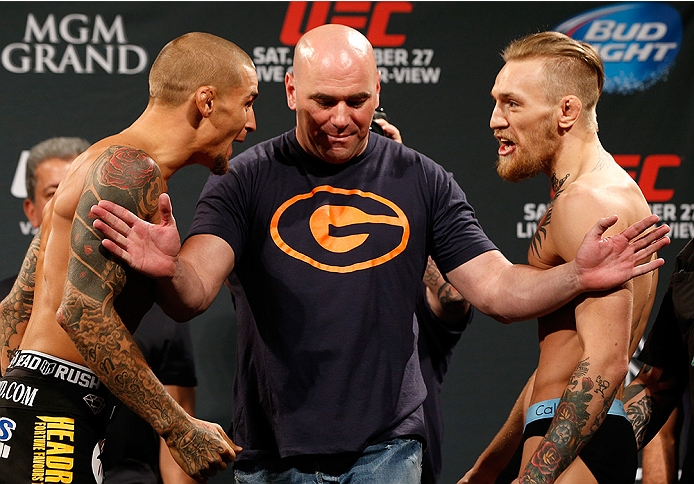 LAS VEGAS, NV - SEPTEMBER 26: (L-R) Opponents Dustin Poirier and Conor McGregor of Ireland face off during the UFC 178 weigh-in at the MGM Grand Conference Center on September 26, 2014 in Las Vegas, Nevada. (Photo by Josh Hedges/Zuffa LLC/Zuffa LLC via G