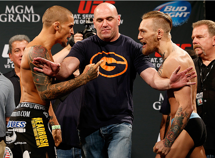 LAS VEGAS, NV - SEPTEMBER 26: (L-R) Opponents Dustin Poirier and Conor McGregor of Ireland face off during the UFC 178 weigh-in at the MGM Grand Conference Center on September 26, 2014 in Las Vegas, Nevada. (Photo by Josh Hedges/Zuffa LLC/Zuffa LLC via G