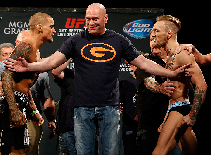 LAS VEGAS, NV - SEPTEMBER 26: (L-R) Opponents Dustin Poirier and Conor McGregor of Ireland face off during the UFC 178 weigh-in at the MGM Grand Conference Center on September 26, 2014 in Las Vegas, Nevada. (Photo by Josh Hedges/Zuffa LLC/Zuffa LLC via G