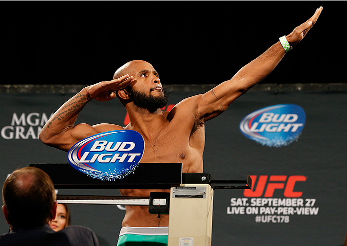 LAS VEGAS, NV - SEPTEMBER 26: Demetrious Johnson poses on the scale after weighing in during the UFC 178 weigh-in at the MGM Grand Conference Center on September 26, 2014 in Las Vegas, Nevada. (Photo by Josh Hedges/Zuffa LLC/Zuffa LLC via Getty Images)
