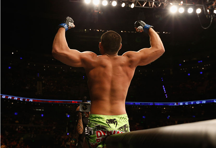 MEXICO CITY, MEXICO - NOVEMBER 15: Hector Urbina celebrates his submission victory over Edgar Garcia in their welterweight bout during the UFC 180 event at Arena Ciudad de Mexico on November 15, 2014 in Mexico City, Mexico. (Photo by Josh Hedges/Zuffa L