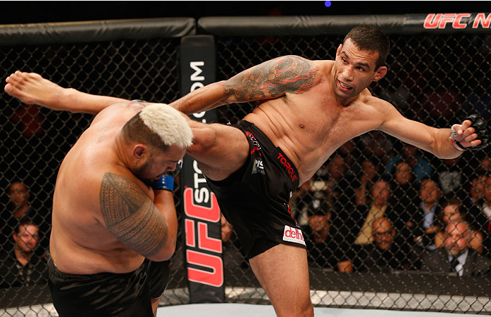 MEXICO CITY, MEXICO - NOVEMBER 15: (R-L) Fabricio Werdum kicks Mark Hunt in their interim UFC heavyweight championship bout during the UFC 180 event at Arena Ciudad de Mexico on November 15, 2014 in Mexico City, Mexico. (Photo by Josh Hedges/Zuffa LLC/Z